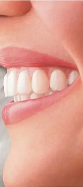 Dentist examining a patient at the clinic